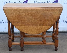 Oak two flap oval gate leg table, 20th Century, 72.5cm high x 121cm extended x 92cm deep