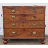 A George IV mahogany chest of drawers, the top inlaid with stringing, the drawers with flame