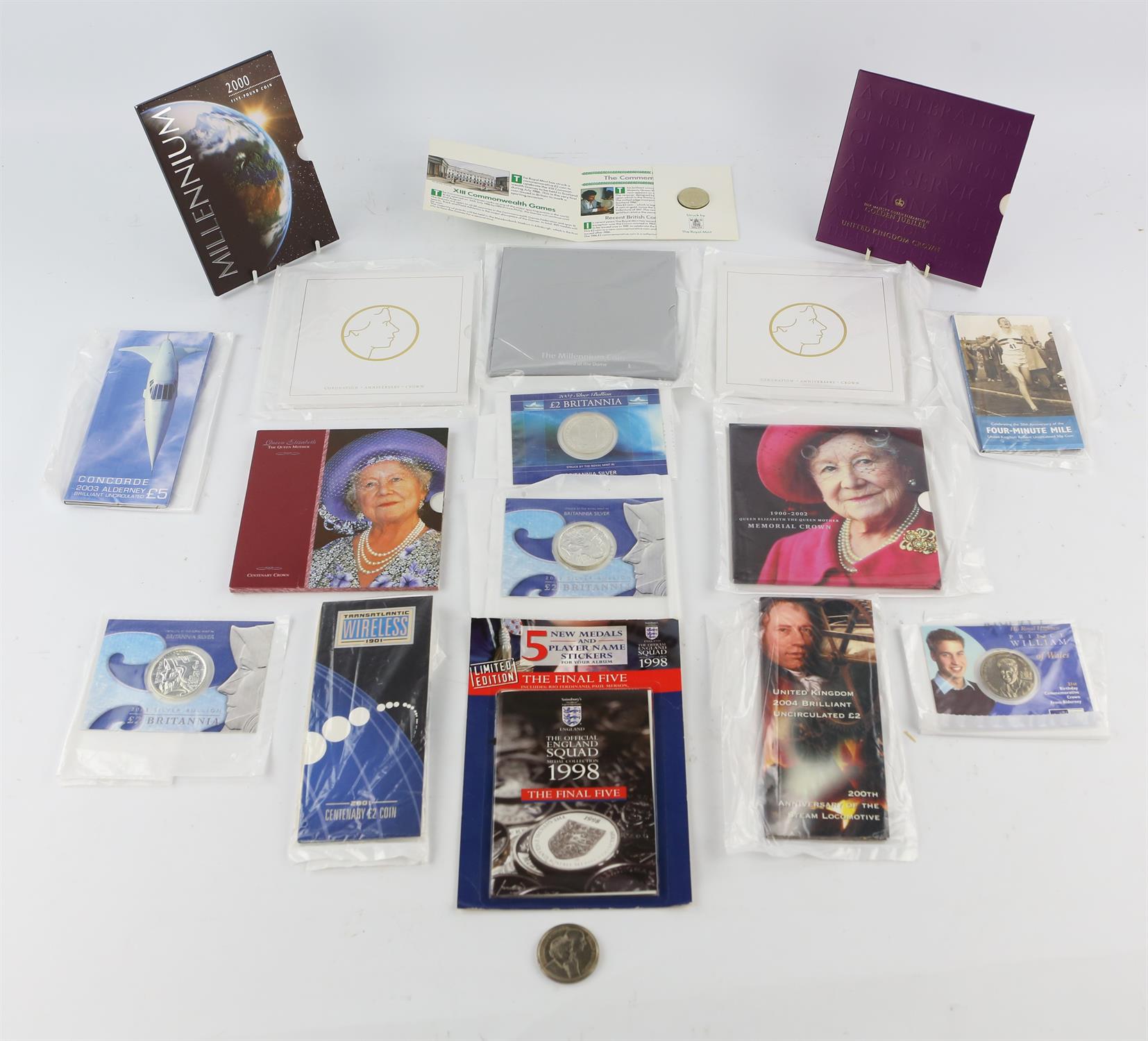 Collection of commemorative crowns, four Royal Mint Britannia silver 1oz coins, in original