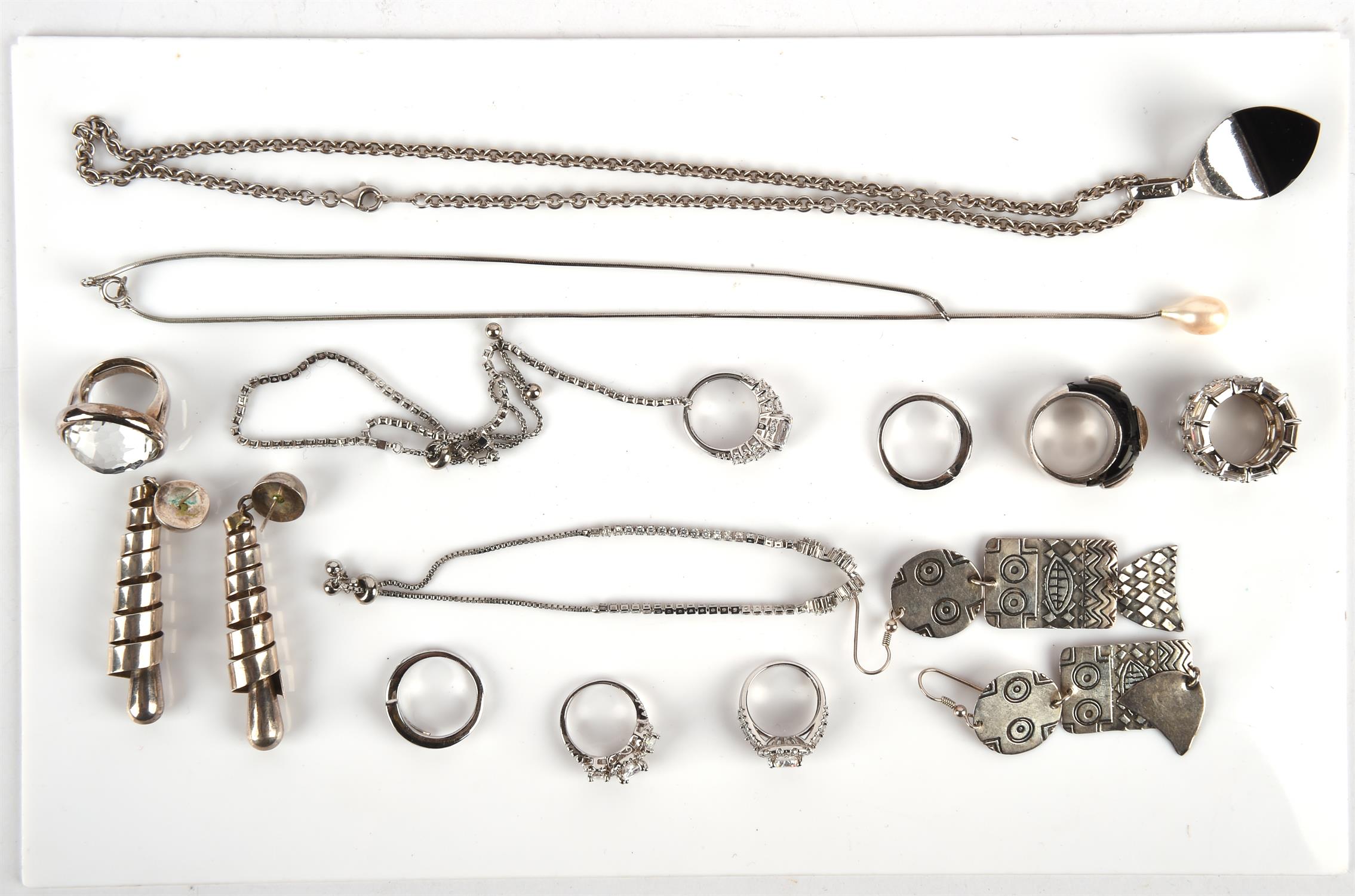 A group of mainly silver jewellery including eight rings, a pair of hallmarked sterling silver
