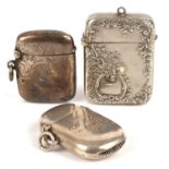 Two silver and one silver plated vesta cases