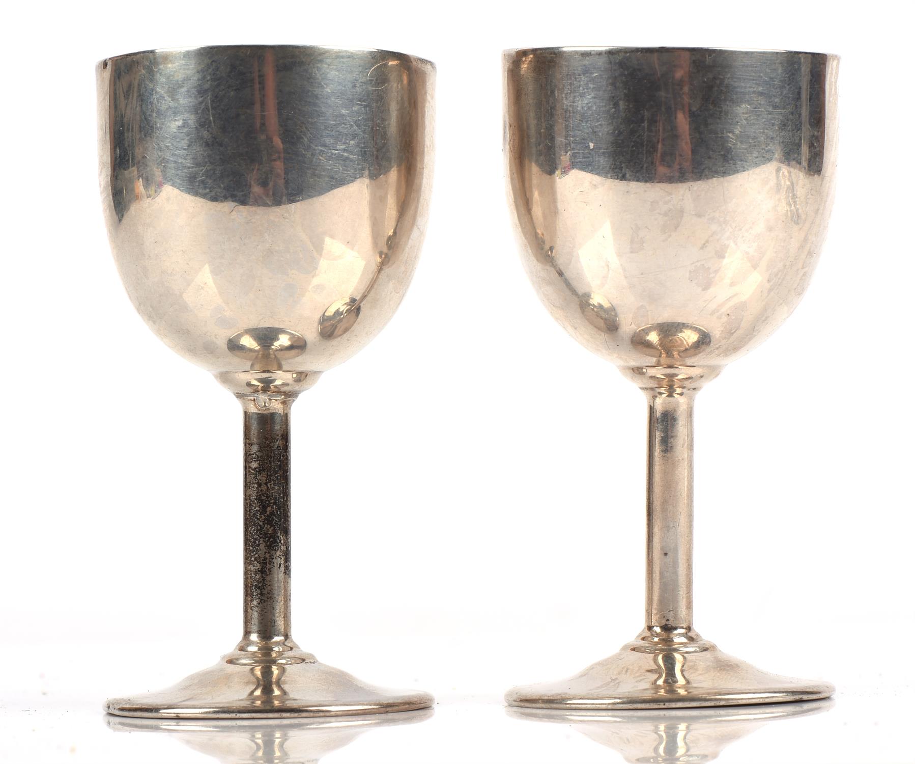 Pair of silver egg cups,