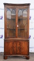 George III styl mahogany corner cupboard, with two astragal glazed doors, enclosing two shelves,