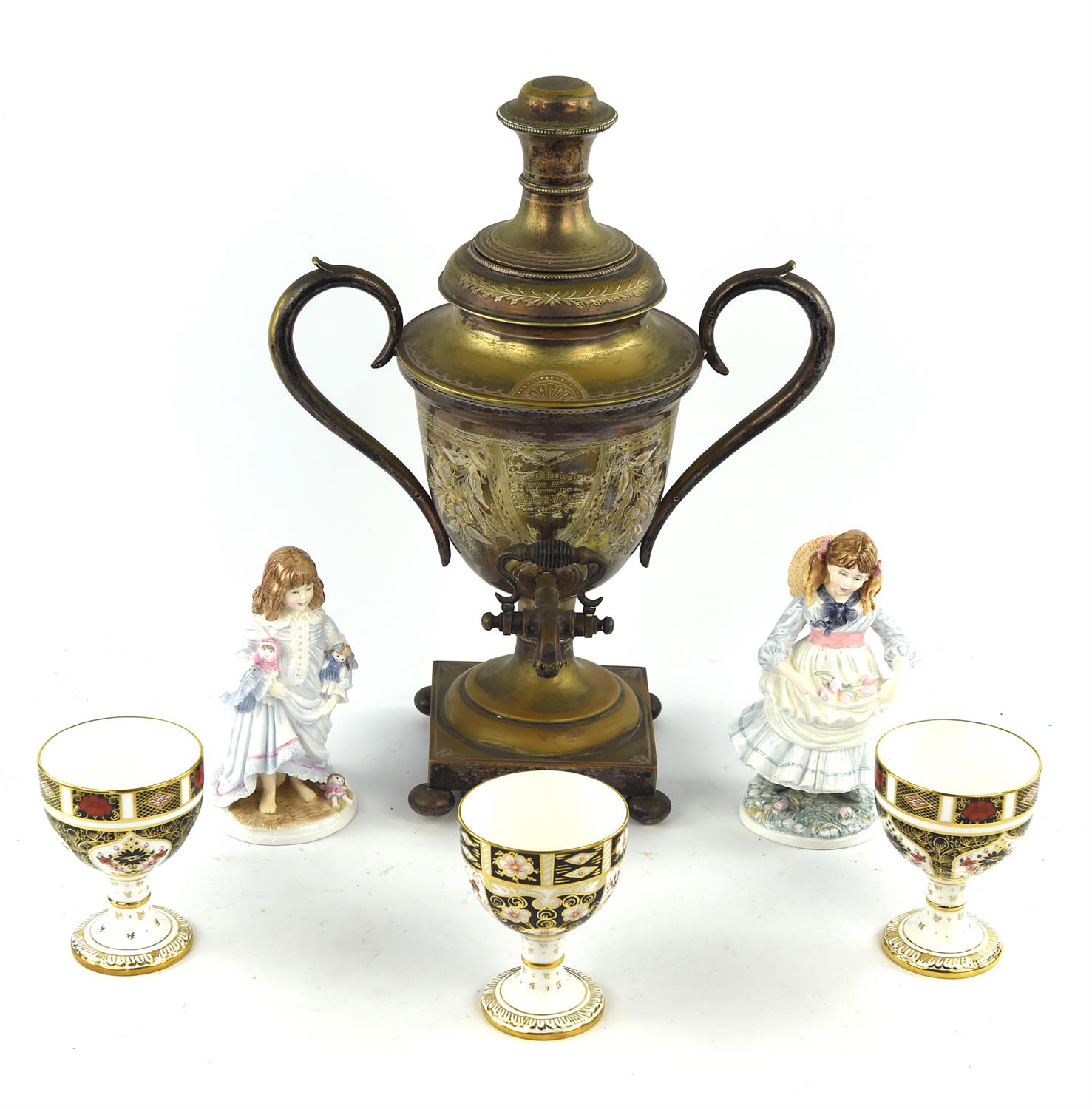 A silver plated presentation tea urn, three Royal Crown Derby goblets and two Coalport figurines,