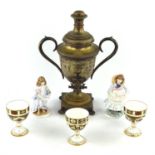 A silver plated presentation tea urn, three Royal Crown Derby goblets and two Coalport figurines,