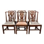 A set of five George III mahogany dining chairs, together with a further matched example, (6)