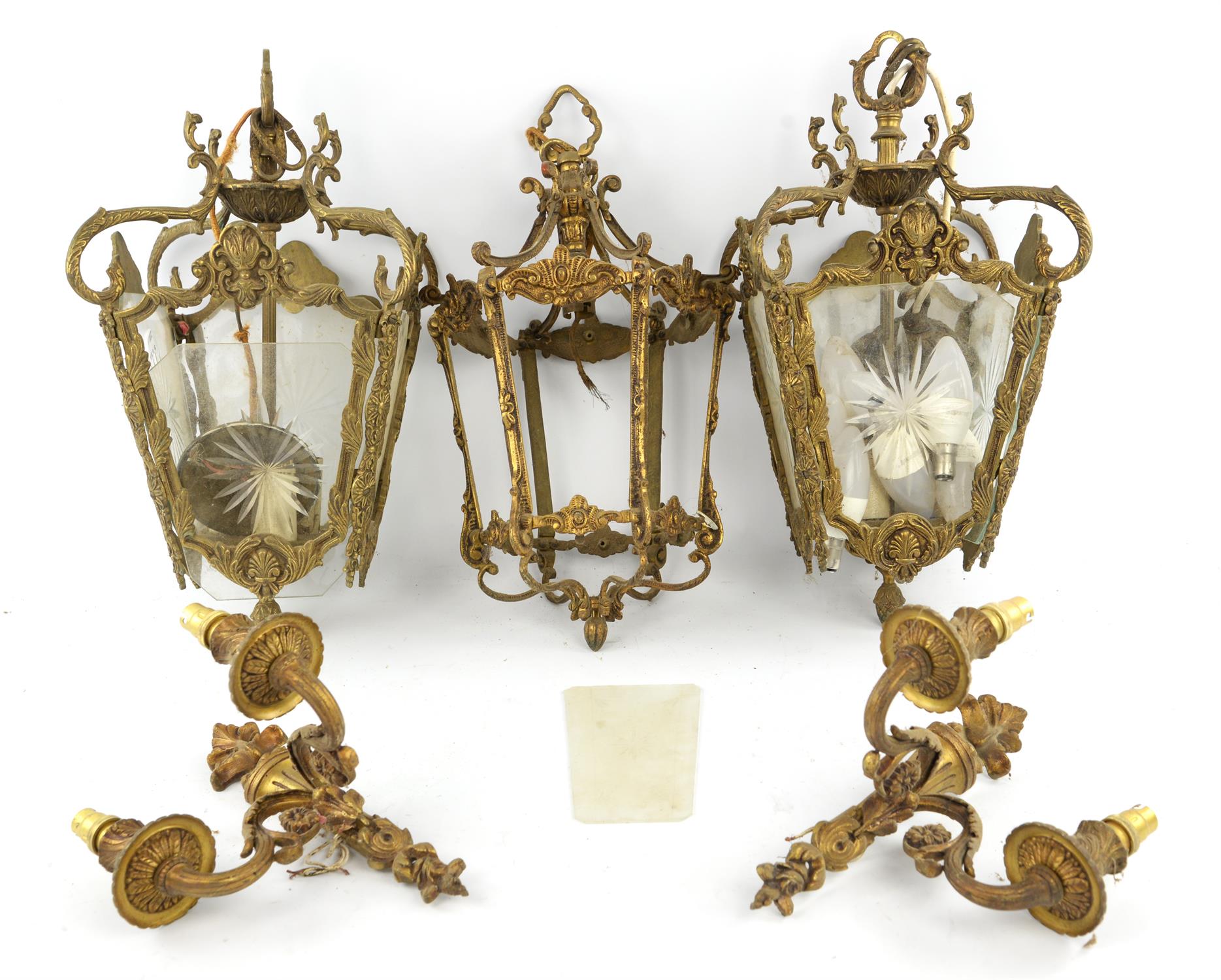 A pair of early-mid 20th century gilt brass hall lanterns of square tapering form,