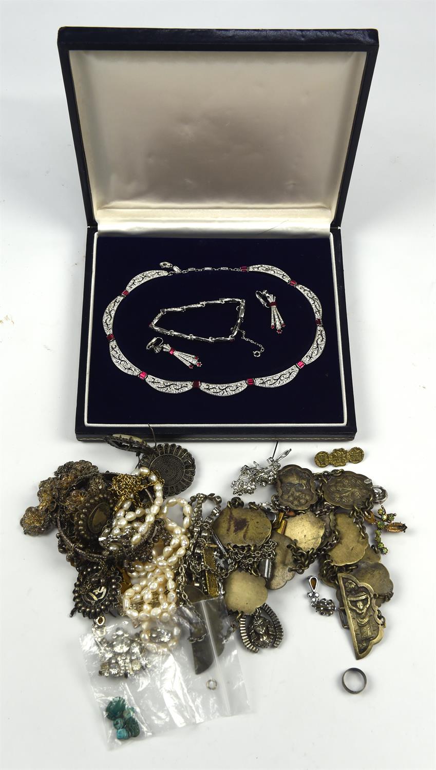 A collection of costume jewellery including a paste necklace earrings and bracelet set