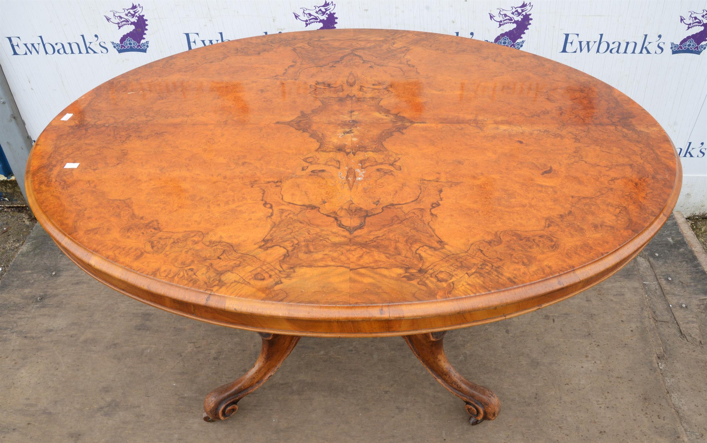 A Victorian walnut oval centre table, the burr walnut quarter veneered top on quadruple cabriole - Image 4 of 4