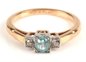 Three stone blue zircon and diamond ring, with a central round cut blue zircon with an old single