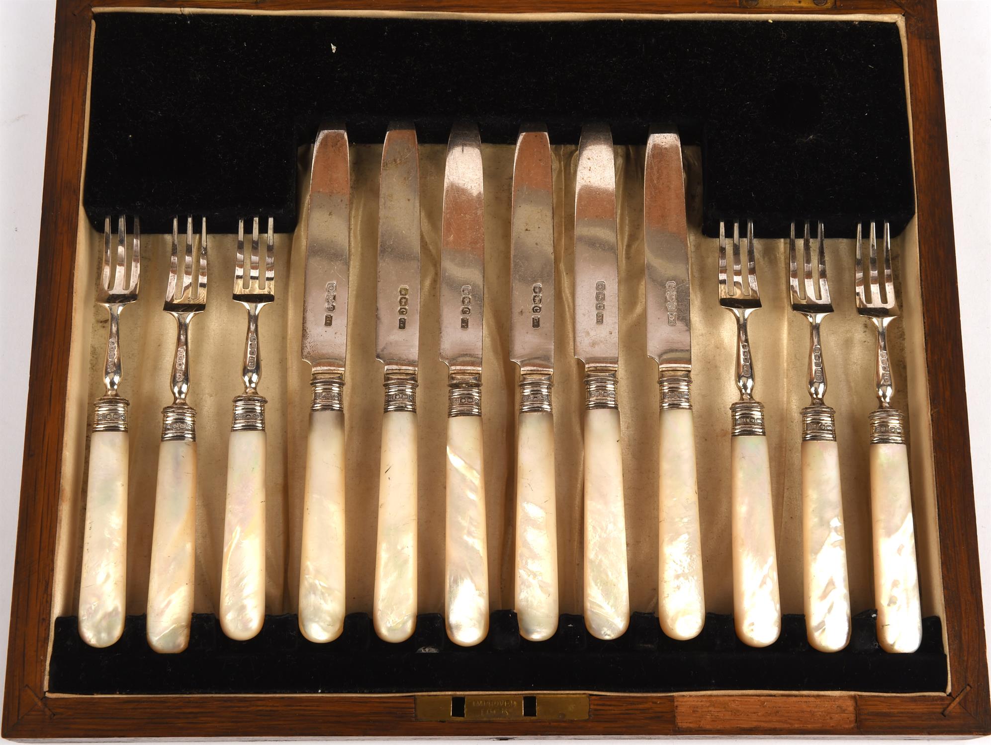 Cased silver fruit eating 12 piece set consisting of 6 forks, 6 knives with mother of pearls