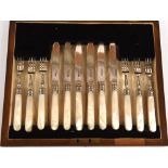 Cased silver fruit eating 12 piece set consisting of 6 forks, 6 knives with mother of pearls