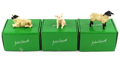 Eight Beswick porcelain animal groups comprising ; Black faced ewe, Suffolk Ewe, Pig sitting,