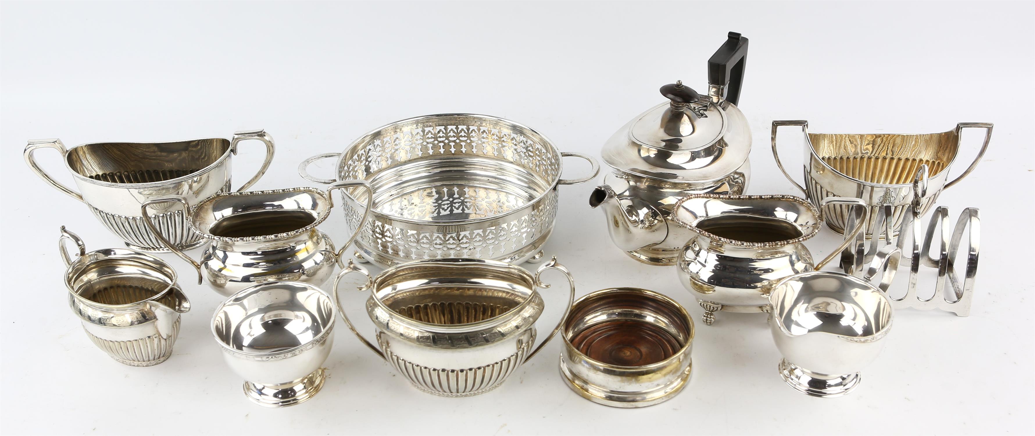 A group of silver plated items, to include a Walker & Hall three piece tea set, a four piece tea - Image 2 of 2