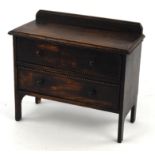 Mahogany miniature chest of two short and two long drawers, H37cm W28.5cm D13cm, 2 white painted
