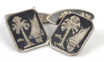 Pair of silver cufflinks in a middle eastern design, Niello