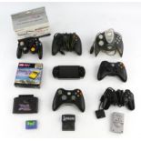 An assortment of controllers, accessories and gaming paraphernalia