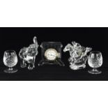 A group of modern Waterford crystal ornaments including ; a pair of candlesticks, 25.5cm, a swan,