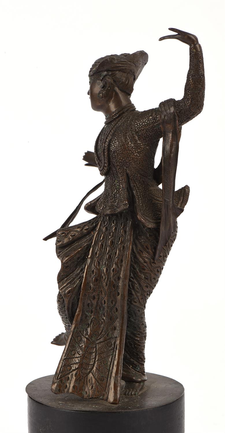 A pair of Balinese [or other South East Asian] bronze dancers; each one on a circular base; overall - Image 6 of 7