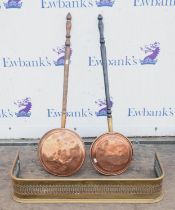 A Victorian pierced brass fender, together with two copper warming pans, fender 89cm long, (3)