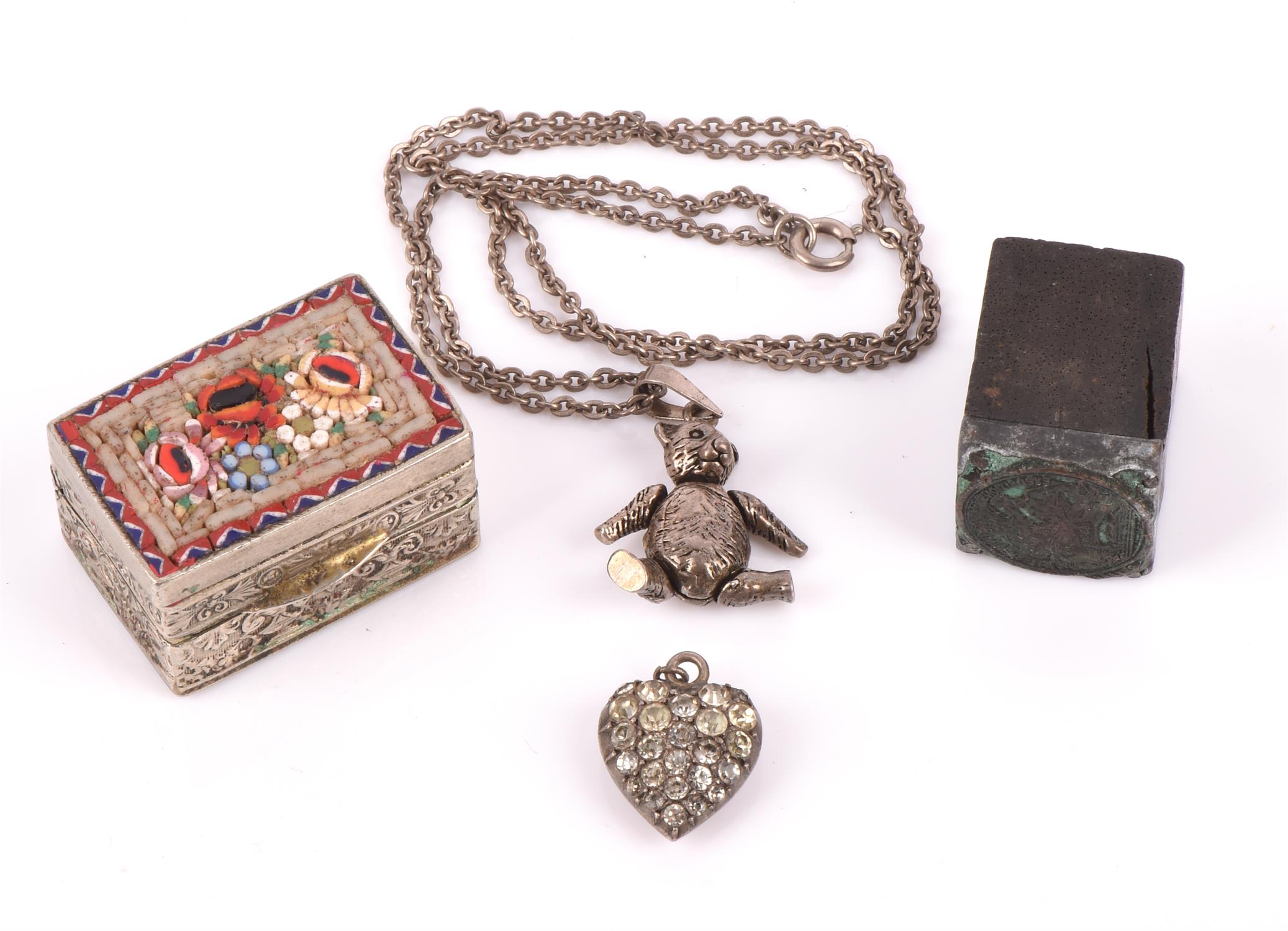 A group of costume jewellery, including a paste set deco double clip, a paste set heart pendant,