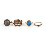 Three rings stamped "14K" consisting of a domed cluster ring with blue stones, ring size L,
