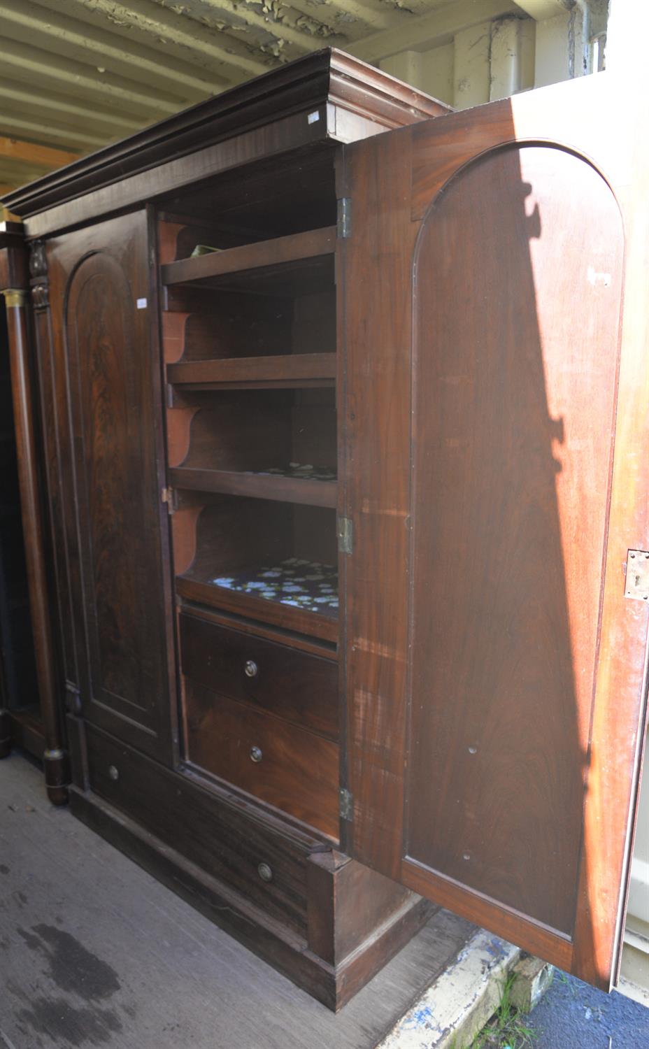 A Victorian mahogany wardrobe, the hinged doors enclosing an arrangement of shelves and drawers - Image 2 of 3