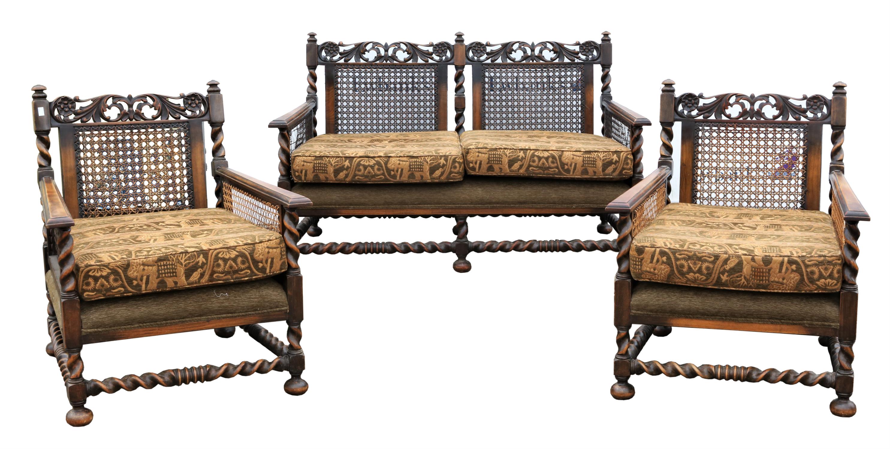 An English walnut and caned three piece bergere suite, in the William and Mary style,1930s,