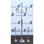 A modern tall silver metal five light candelabra, 155cm high. and a pair of smaller similar