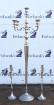 A modern tall silver metal five light candelabra, 155cm high. and a pair of smaller similar