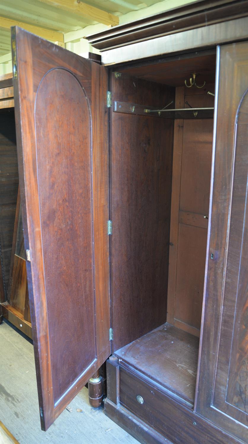A Victorian mahogany wardrobe, the hinged doors enclosing an arrangement of shelves and drawers - Image 3 of 3