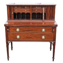 A George III style mahogany writing cabinet, Continental, the upper section with tambour doors