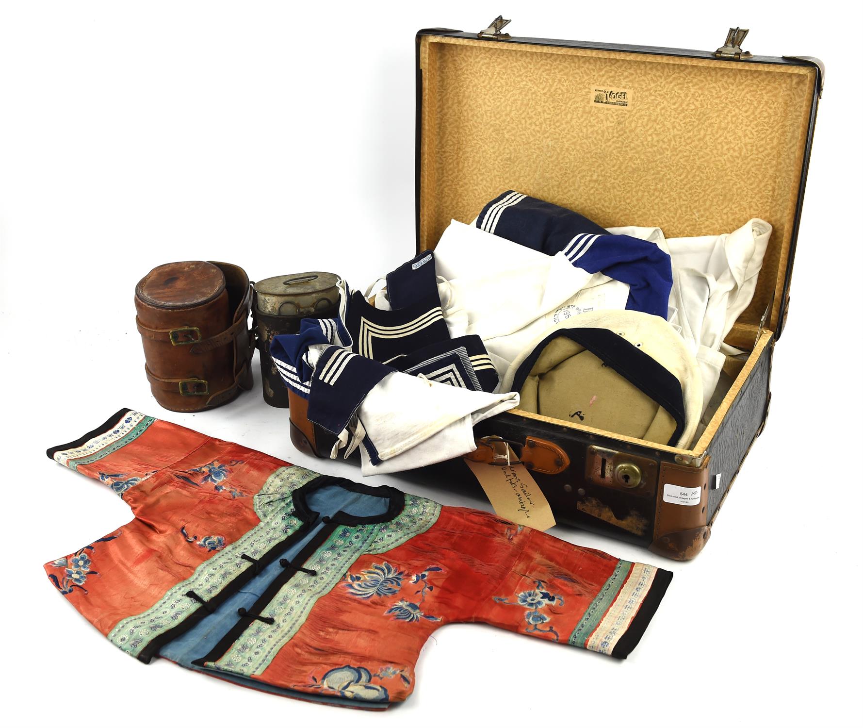 A small German suitcase by Vogel, containing a child's Chinese silk jacket, silk splitting,