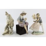 A collection of Lladro porcelain figures including 'Beggar' No 1094, 'Debbie and her Doll' No1379,