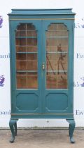 A George III style blue painted and gilt bookcase, 1910/20s, in the Chinese taste, on cabriole legs,