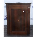 Mahogany corner cupboard, 19th century, dental moulded top with single door, H89 x W68 x D38cm