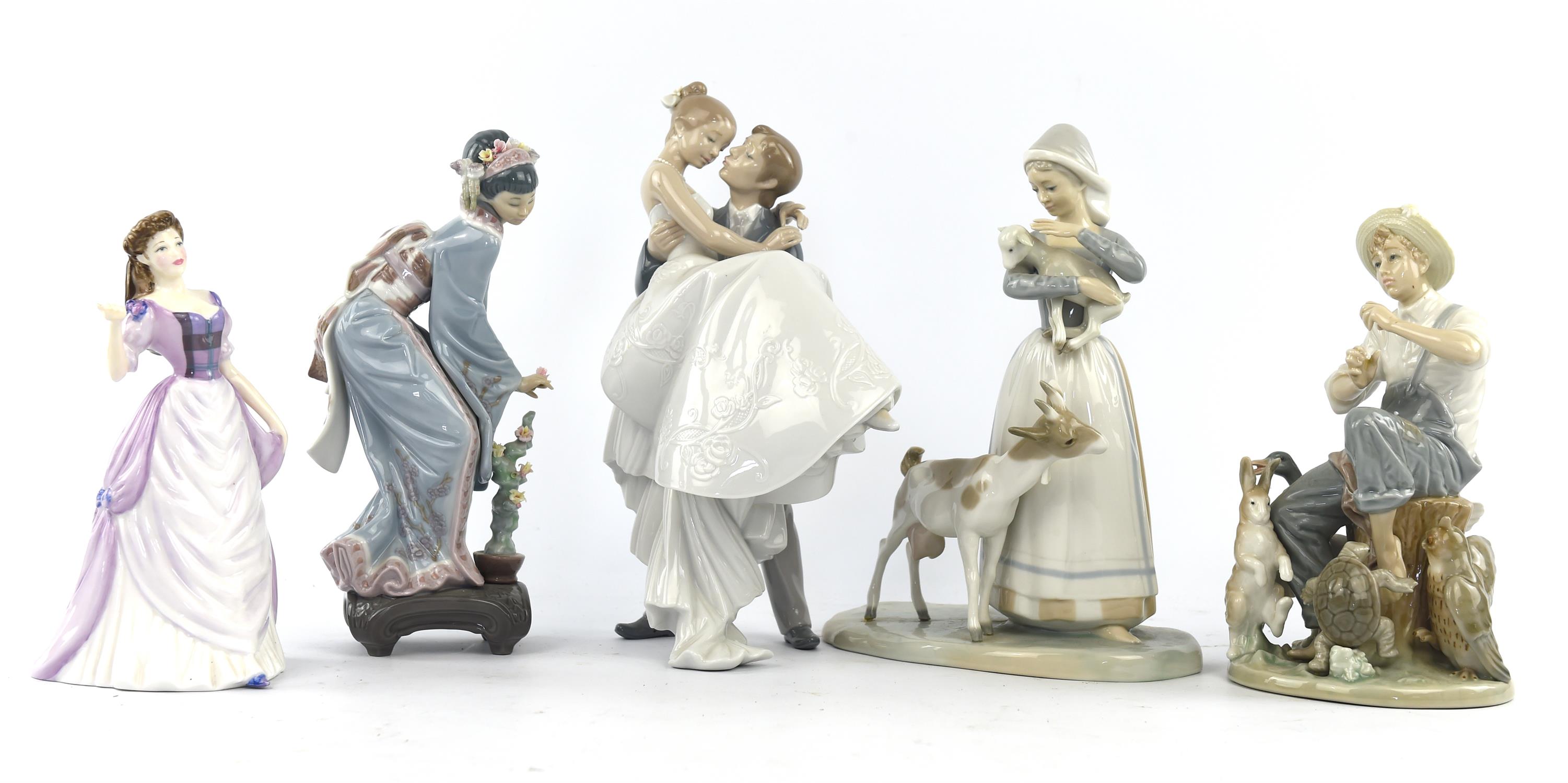 Four Lladro porcelain figure groups including ; Shepherdess with goats, height 25cm, 'Happiest Day',