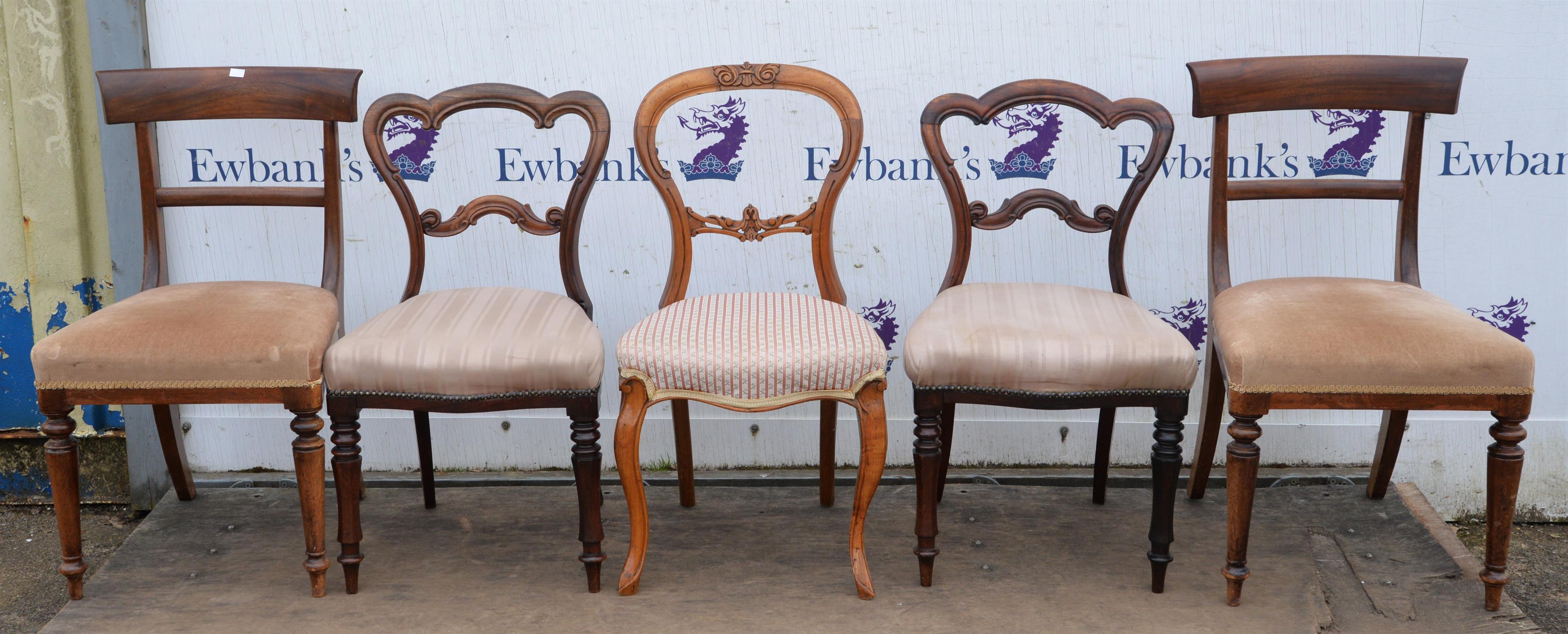 A pair of George IV mahogany dining chairs, with curved top rails, a pair of Victorian rosewood