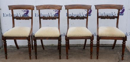 A set of four George IV rosewood dining chairs, with drop in seats and lappet carved legs, H 86cm,