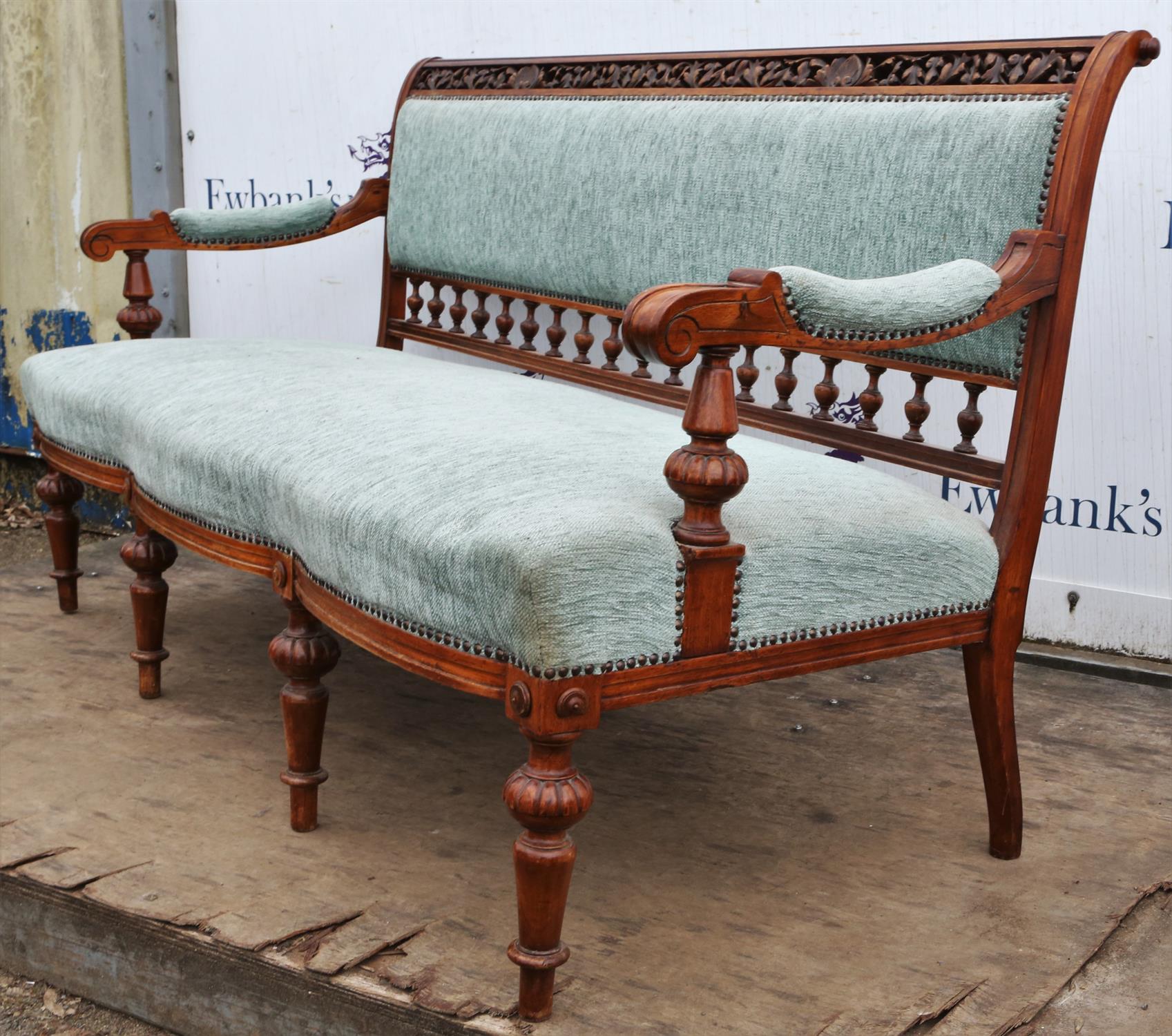 A late Victorian walnut and upholstered settee, the top rail pierced and leaf carved, - Image 6 of 6