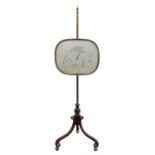 A Regency mahogany pole screen, the adjustable screen with an associated silkwork panel, H 141cm,
