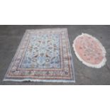 Persian design rug the light blue ground with birds amongst foliage, 256cm x 200 and a Chinese oval