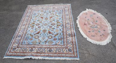 Persian design rug the light blue ground with birds amongst foliage, 256cm x 200 and a Chinese oval