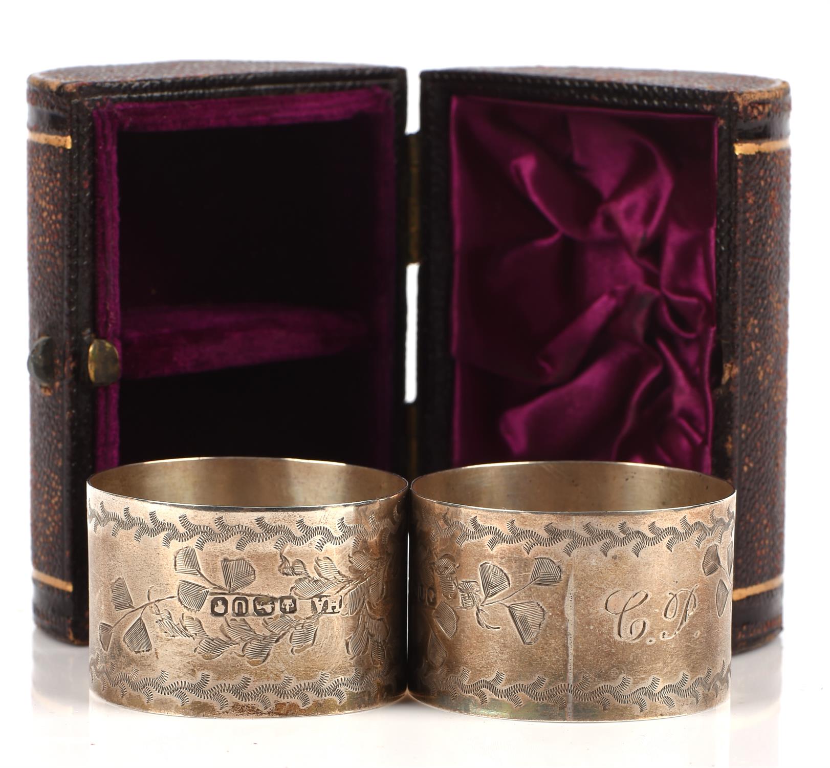 Victorian silver napkin rings in leather case, Henry Aitkin, Sheffield, 1887,