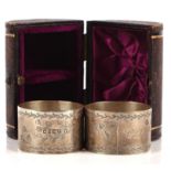 Victorian silver napkin rings in leather case, Henry Aitkin, Sheffield, 1887,