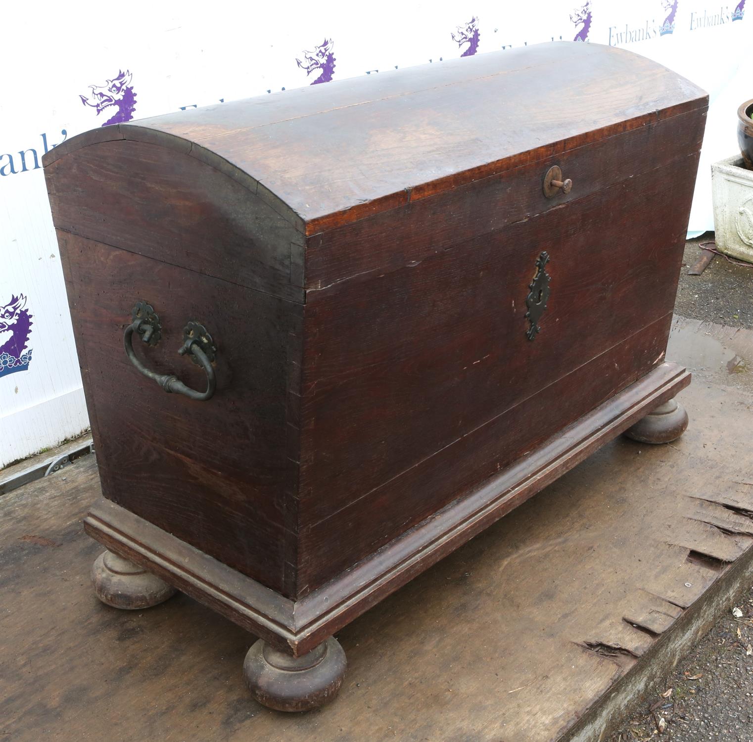 A 19th century dome topped oak chest with iron handles. 112 cm wide x 58 cm deep x 83 cm high. - Image 2 of 3