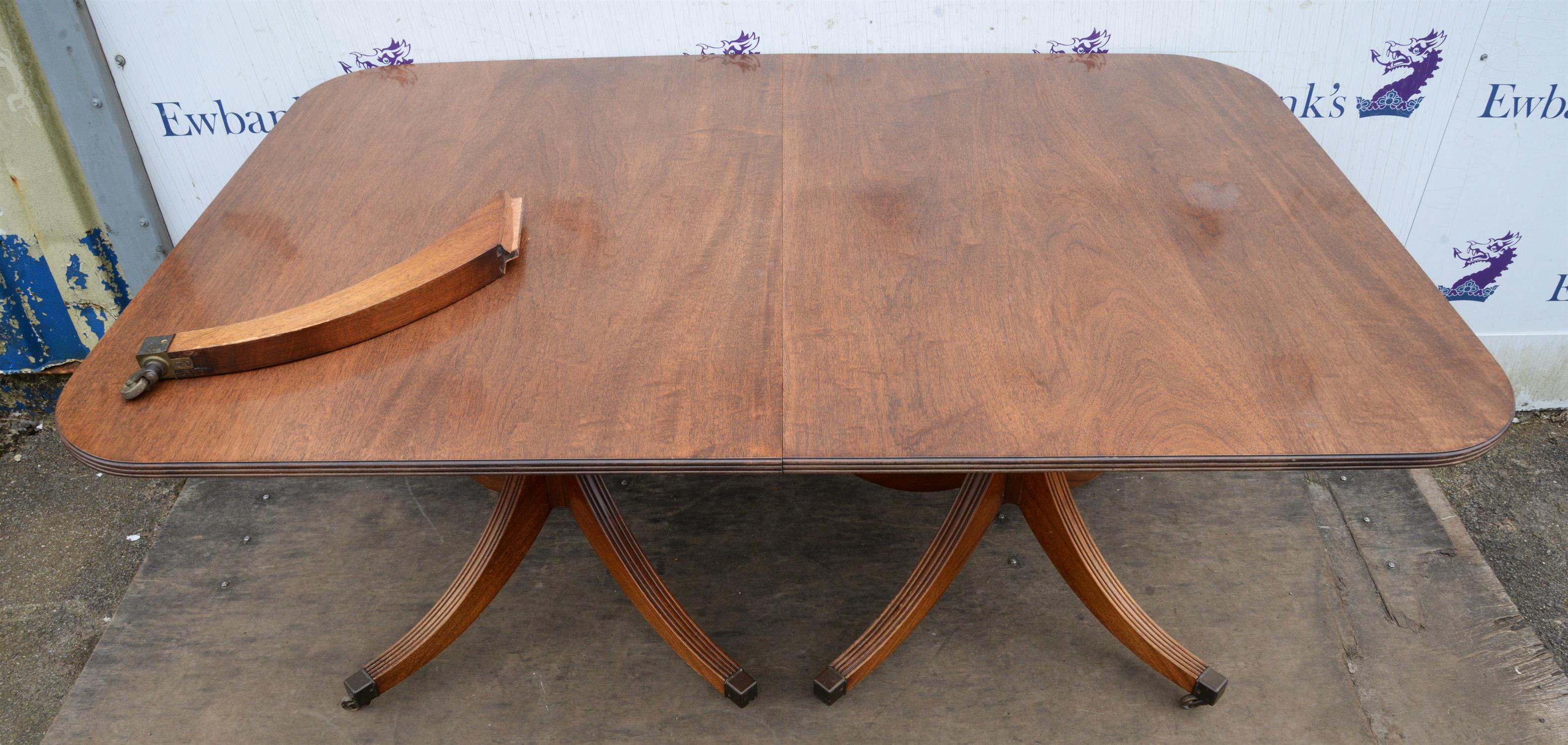 A Regency mahogany twin pillar dining table, the column supports with quadruple sabre legs and - Image 3 of 3