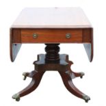 A George IV mahogany pedestal pembroke table, 1820s, the sold top above two drawers,