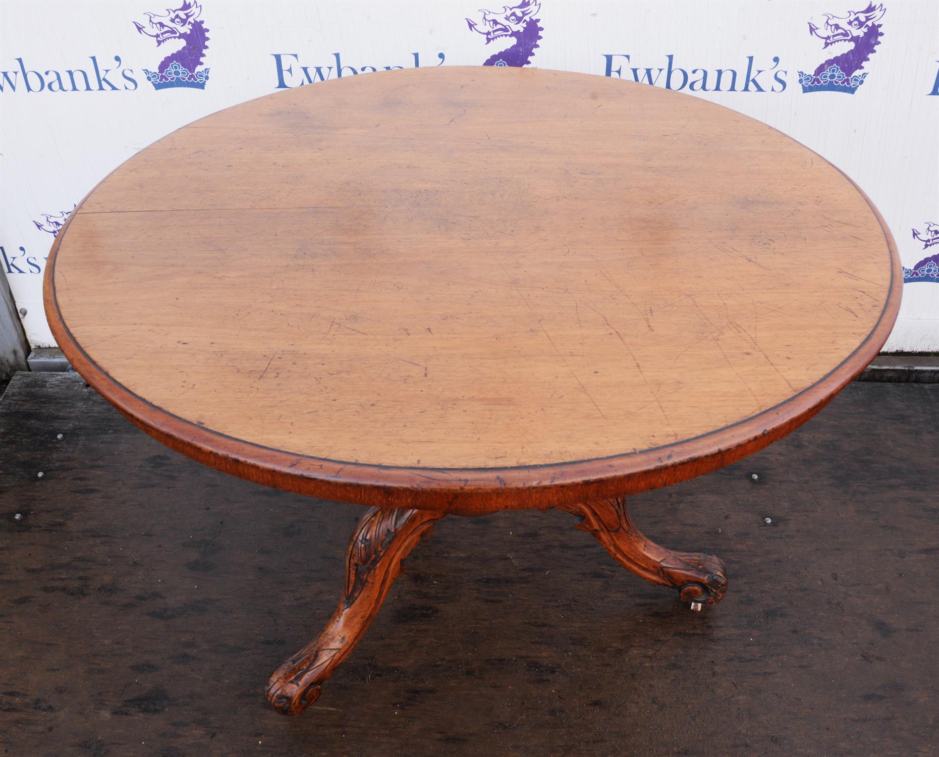 Victorian walnut breakfast table, circular top on a baluster stem with leaf carved cabriole legs, - Image 2 of 2