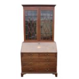 A George III mahogany bureau bookcase, top and base associated, later strung and banded, H 213cm,